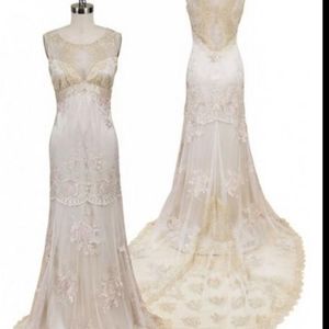 Fitted lace applique illusion neckline bridal gown